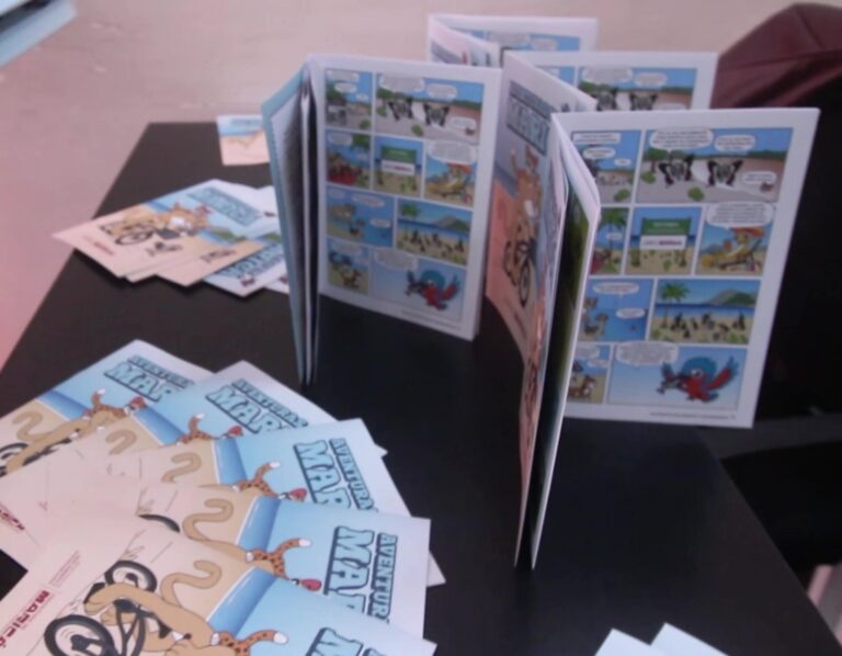 Capa do livro 'Aventuras em Maricá' com ilustrações de animais da fauna local e crianças explorando a natureza.